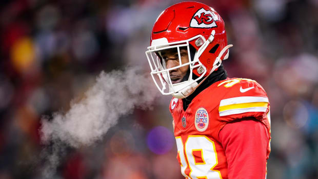 L’Jarius Sneed blows out a breath in the cold air